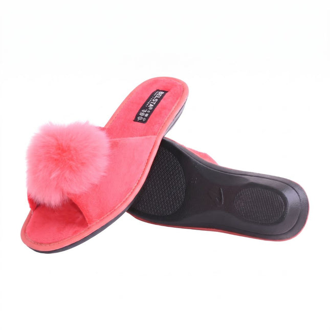 The Coral Pom-Pom Slippers by BELSTA — side view of the velour upper and non-slip sole