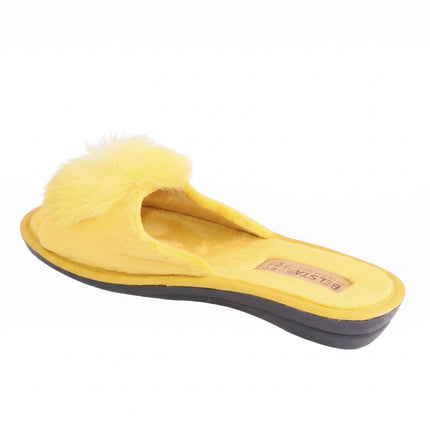 BELSTA Mustard Pom-Pom Slippers — top view of the pair with cushioned velour footbed