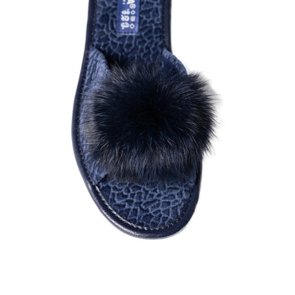 Close-up of fluffy fur pom-pom on navy velour slipper toe - BELSTA The Midnight Slippers