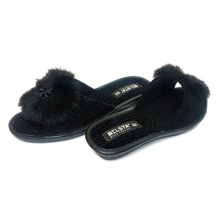 Black velour slide slipper with plush faux-fur bow, side view - BELSTA The Noir Bow Slippers